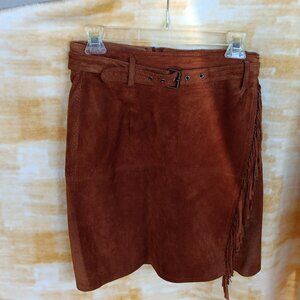 soft suede skirt fully lined isn't really orange but a rust color